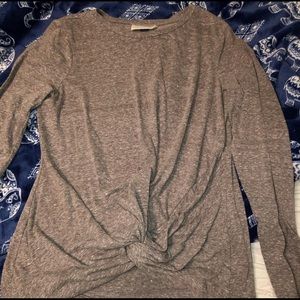 Long sleeve tied shirt.